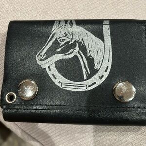 Black wallet with thick leather simple design silver buttons clips shut